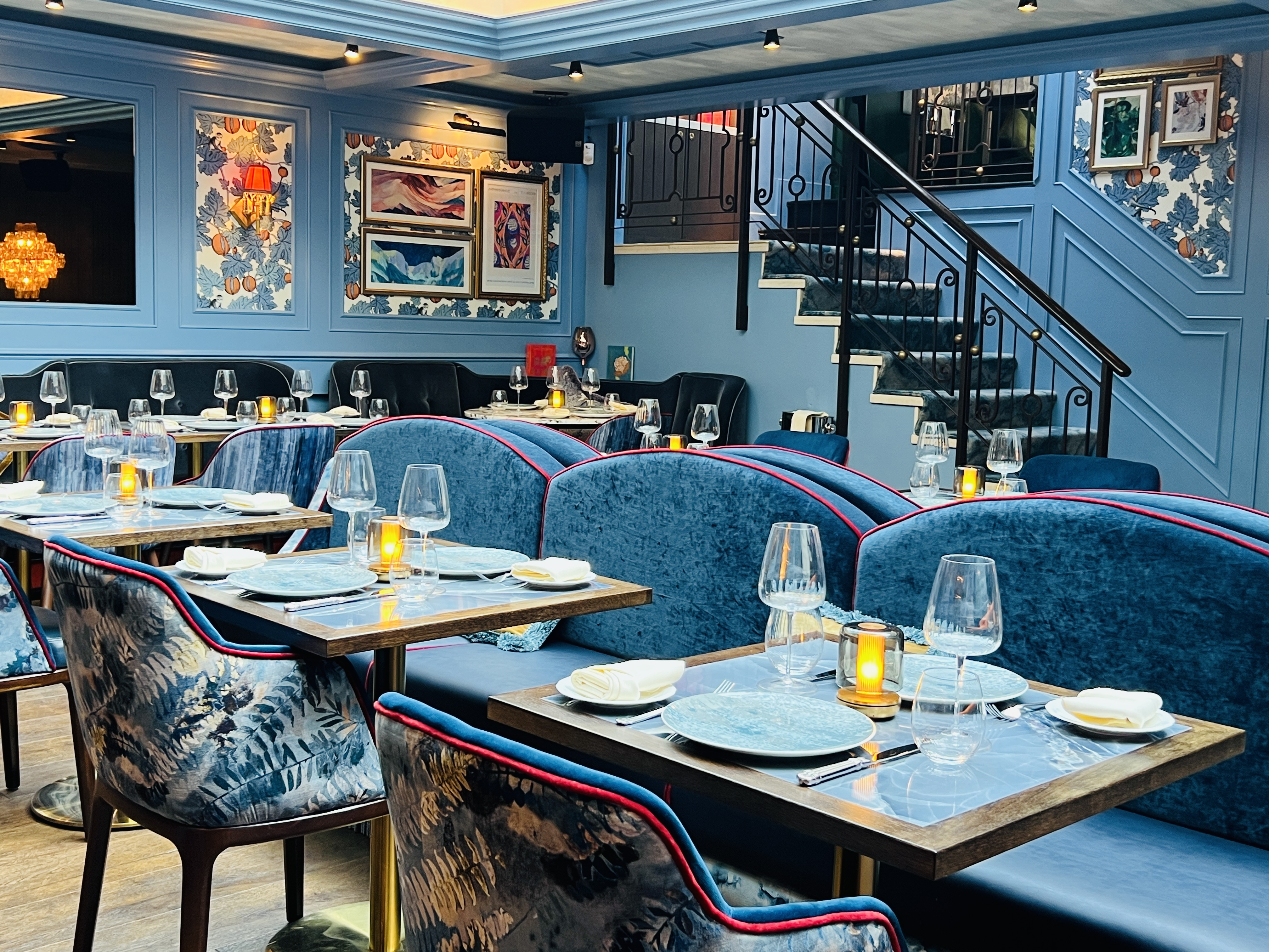 Ridge Room at VATAVARAN: Sophisticated blue banquette dining space for corporate events and meetings.