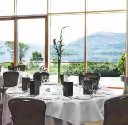 Elegant dining setup in The Ballroom, Europe Hotel for corporate events and special occasions.