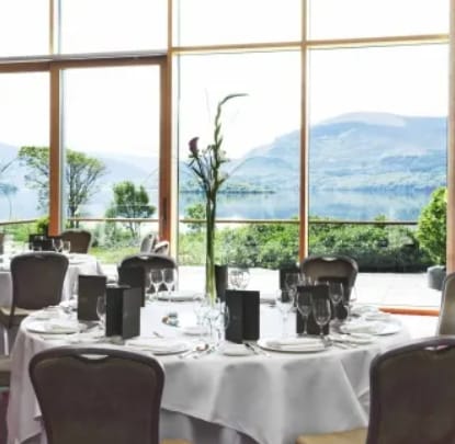 Elegant dining setup in The Ballroom, Europe Hotel for corporate events and special occasions.