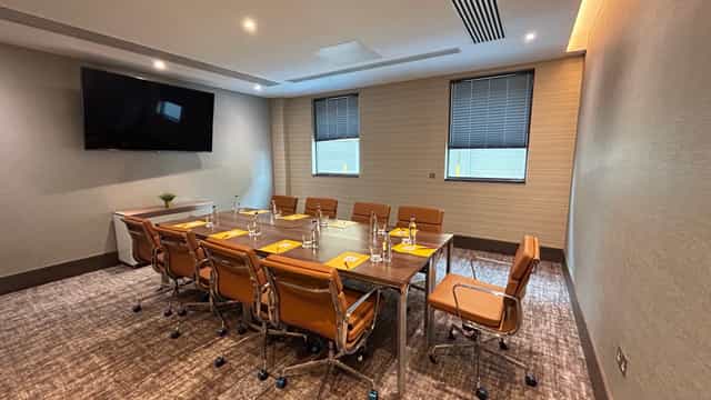 Wimbledon Suite at Crowne Plaza: modern meeting room with natural light for business events.