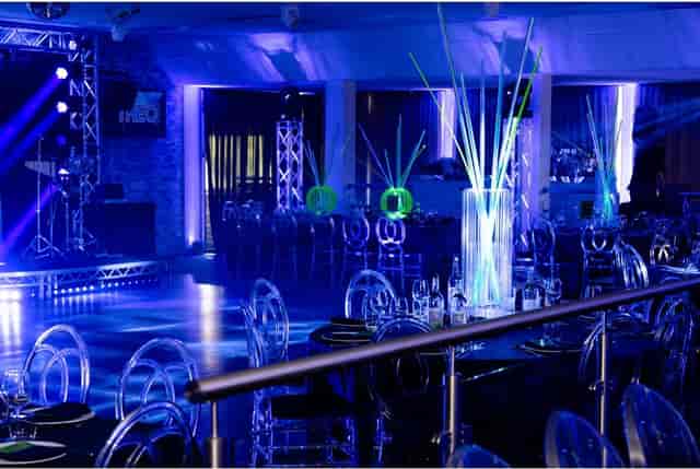 Modern Ballroom event space with architectural lighting, perfect for gala or corporate celebrations.