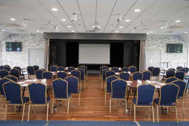 The Ballroom at Metropolitan Bushey: Banquet hall with stage for corporate events and celebrations.