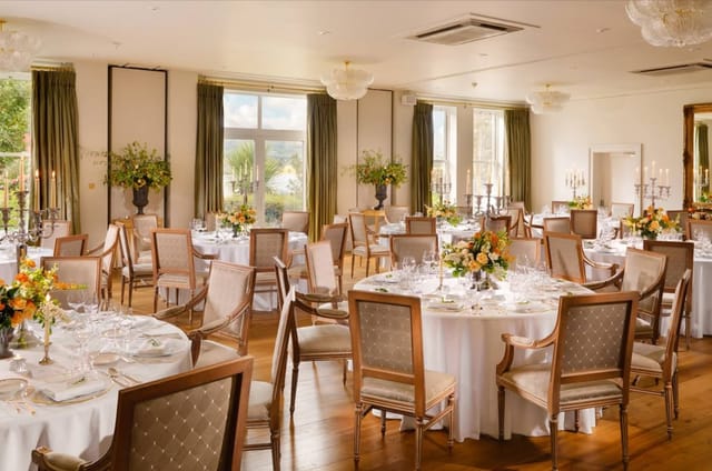 William Petty Suite banquet room with floral decor, ideal for receptions or corporate events.