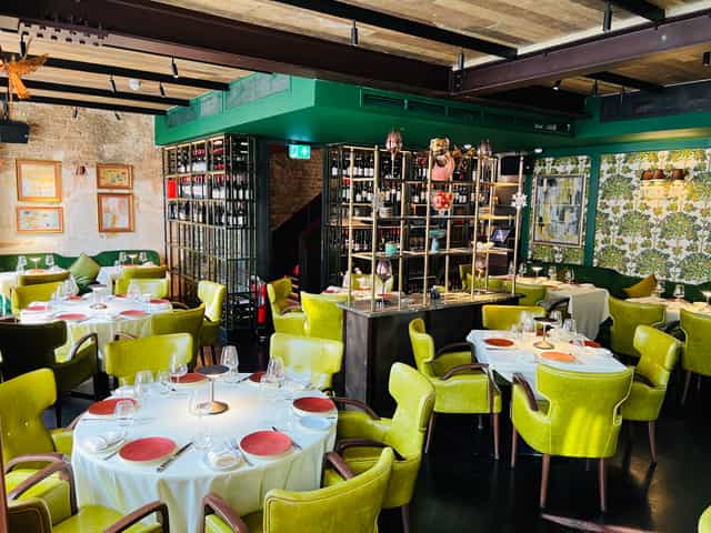 Meadow Private Room at VATAVARAN: Vibrant seating for corporate dinners and networking events.