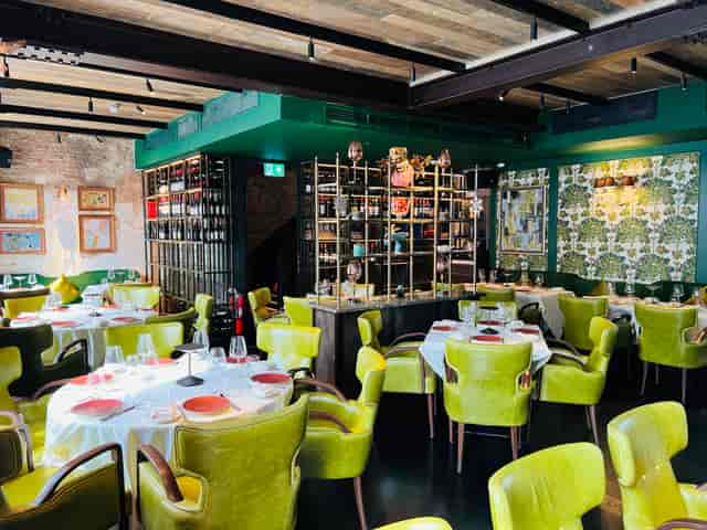 Meadow Private Room: Vibrant seating for corporate dinner or high-end networking reception.