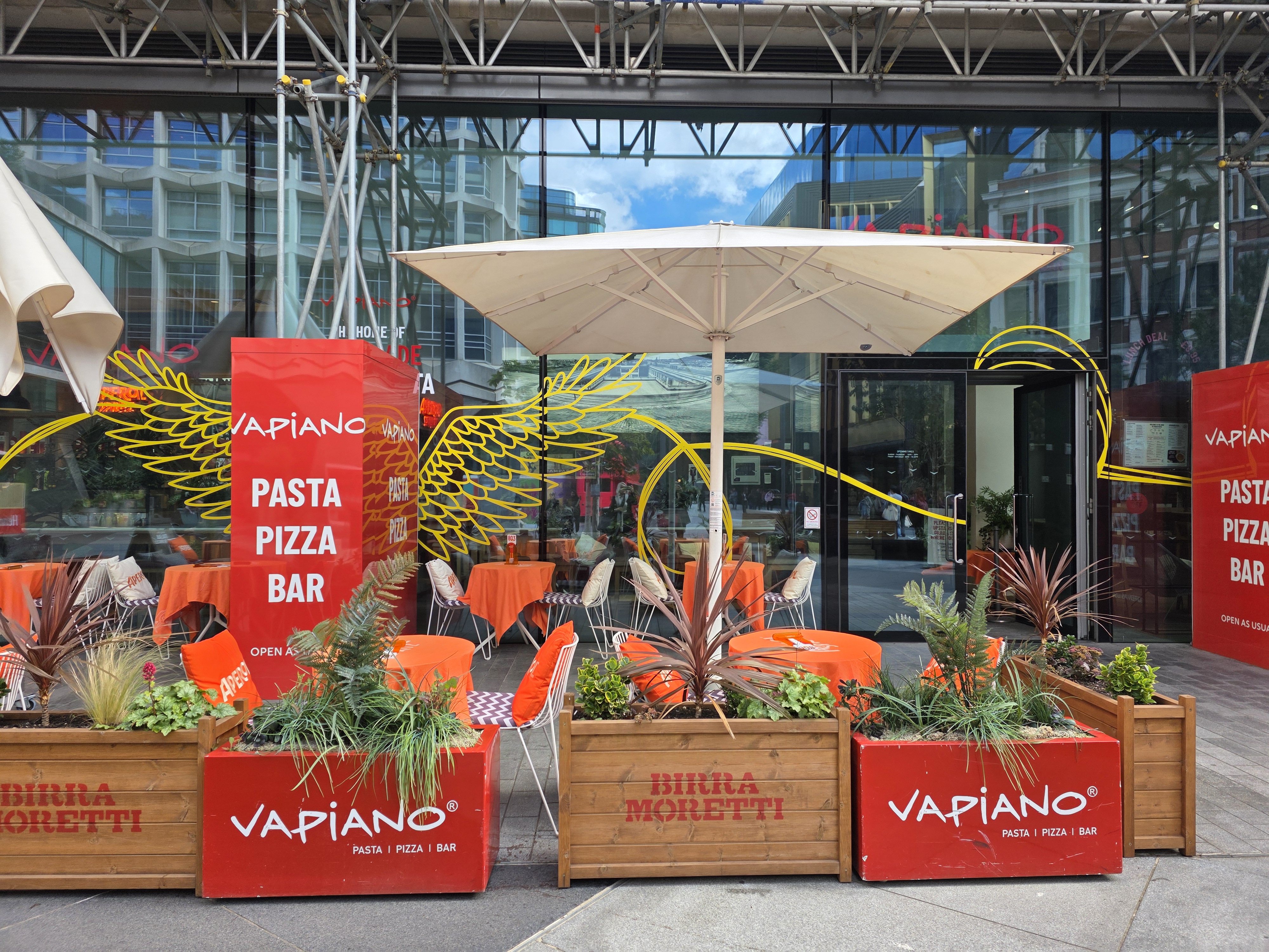 Inviting outdoor dining area at Vapiano Tottenham Court Road for casual events and networking.