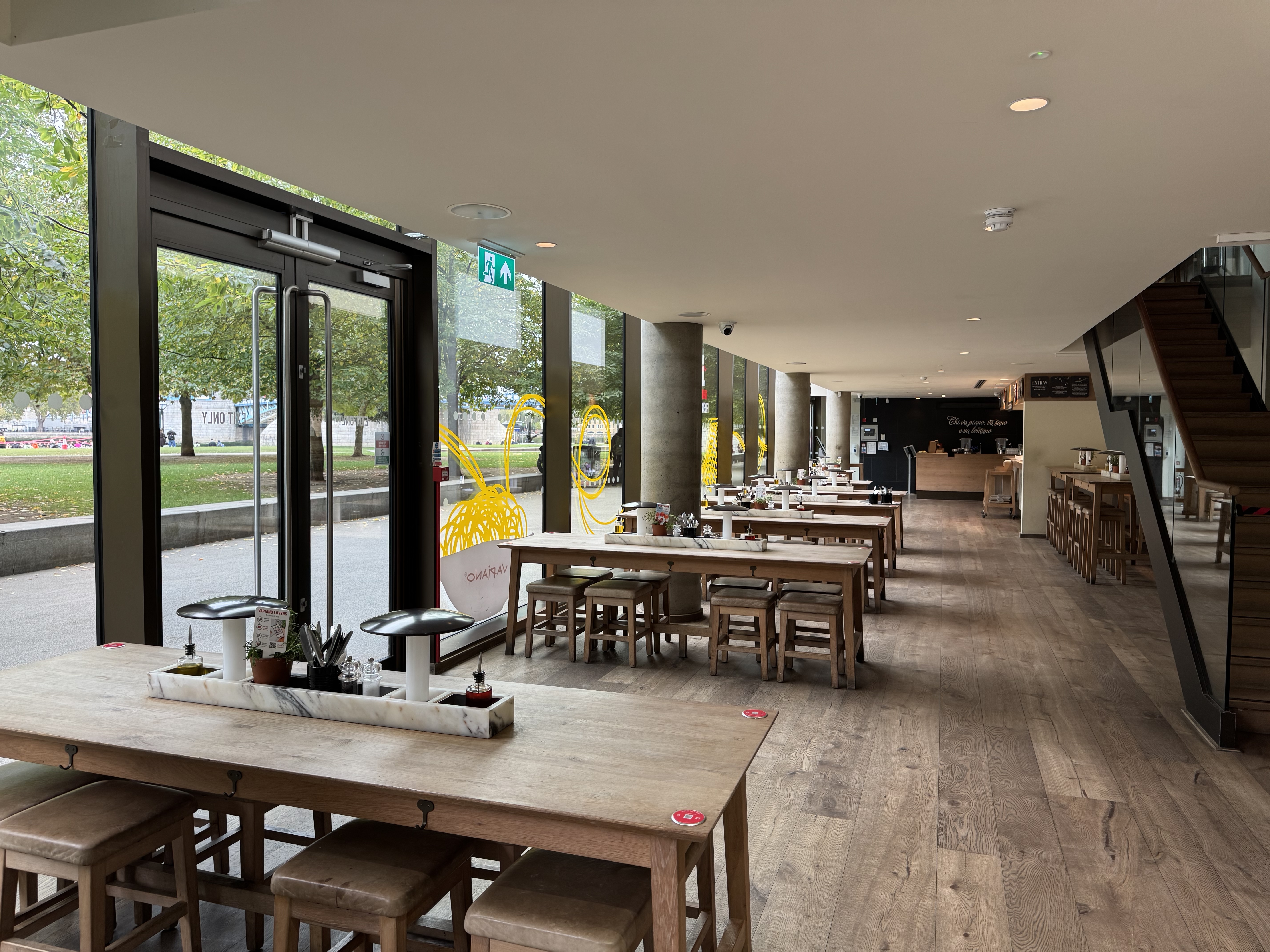 Modern dining area at Vapiano Tower Bridge, perfect for networking and events.
