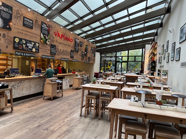 Modern dining space at Vapiano Tower Bridge, ideal for casual meetings and networking.