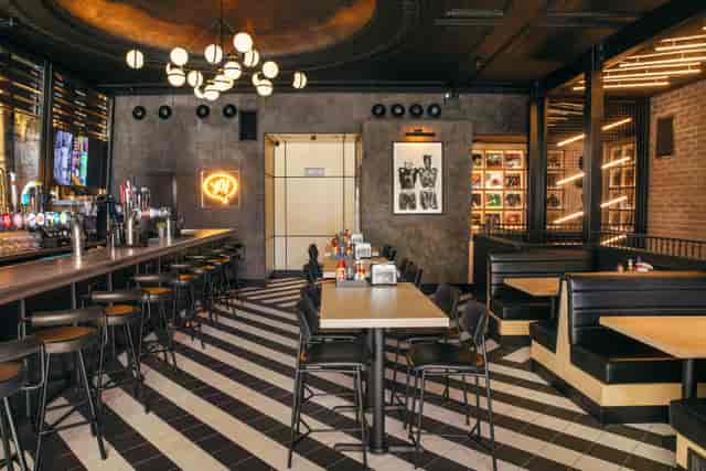 Industrial-chic Black Tap venue for private corporate events and networking receptions.