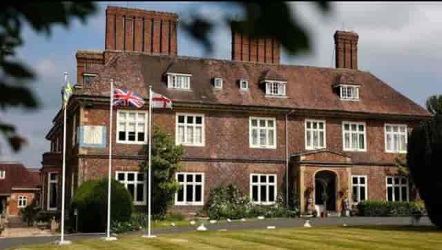 Albrighton Suite, elegant venue for corporate retreats and events with stunning architecture.