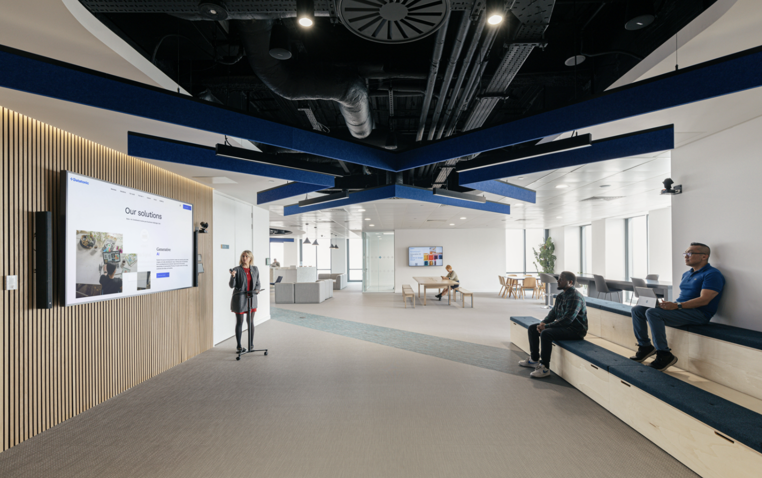 Modern meeting room at Datatonic, ideal for team collaboration and presentations. - Banner