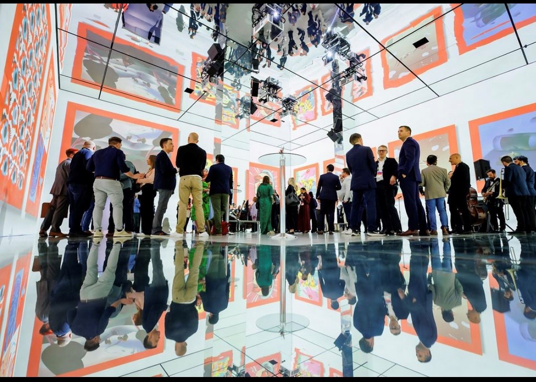 Dynamic event space with reflections and projections for networking and innovation. - Banner