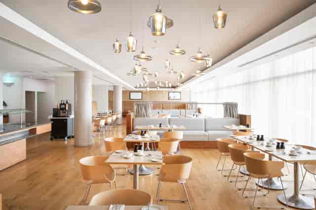 Modern dining space at Le Café Restaurant, ideal for meetings and events in Voco Reading.
