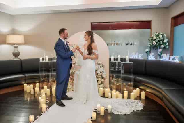 Intimate wedding ceremony at Le Café Restaurant, elegant decor and romantic ambiance.