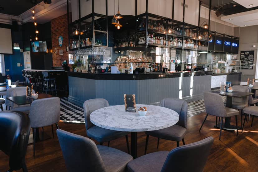 Stylish bar venue at The Thirsty Scholar, ideal for networking and casual meetings.