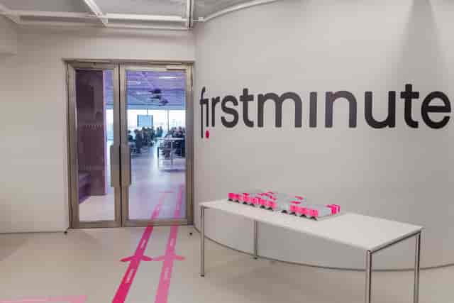 Illuminate corporate event, modern entrance, firstminute branding