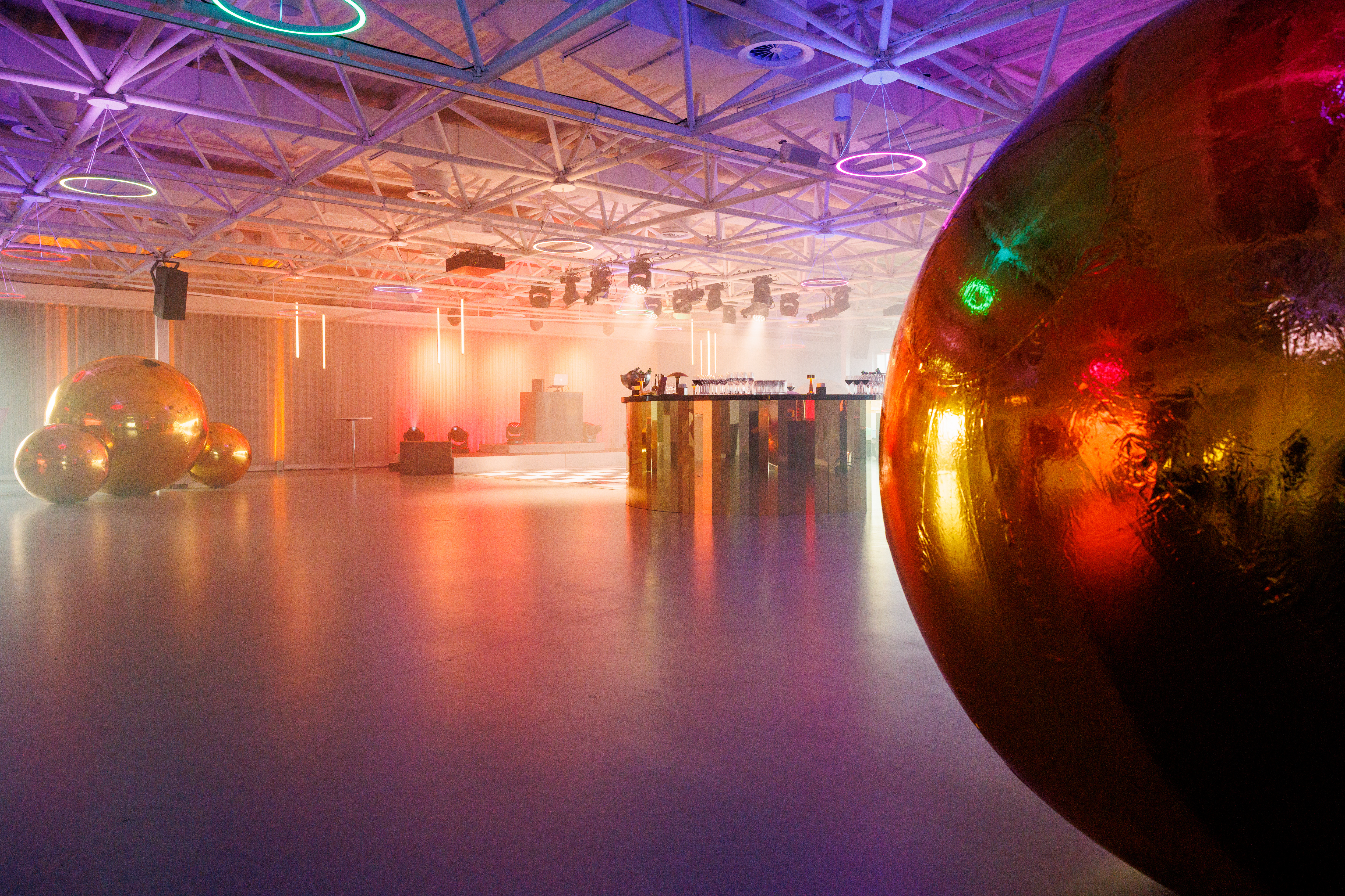 Illuminate Science Museum event space, metallic spheres, product launch, corporate party