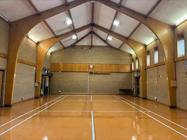 Heather Room hall with arched timber ceiling: ideal for corporate events and community gatherings.