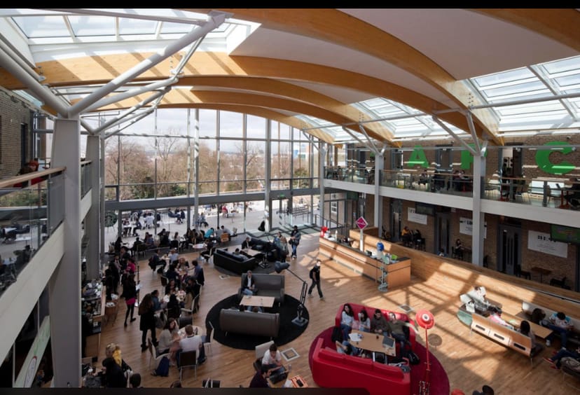 University of Leicester Students' Union airy atrium for modern conference networking and events.