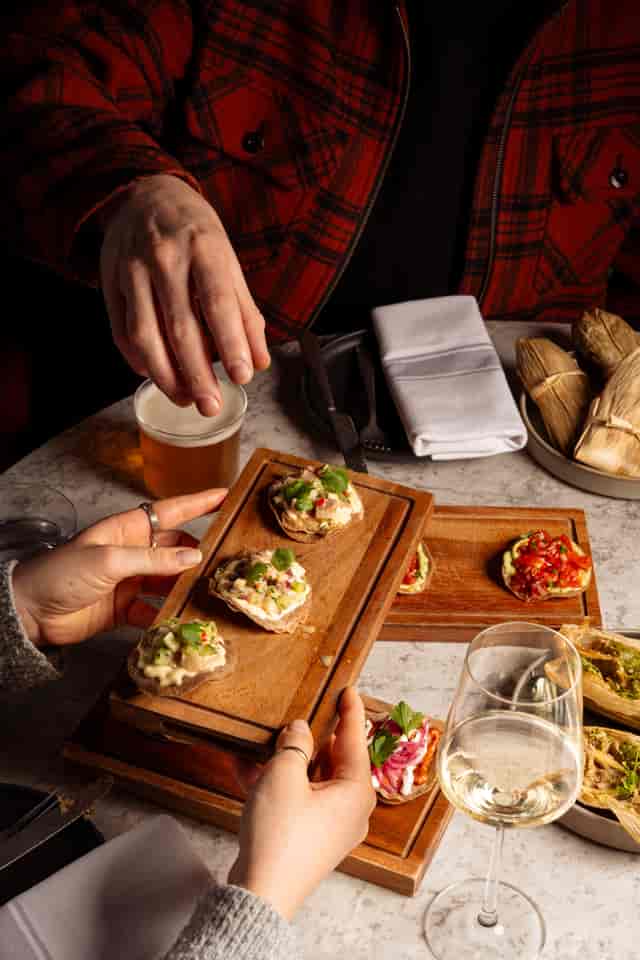 Gourmet small bites in elegant setting at Shoreditch Arts Club for upscale receptions.