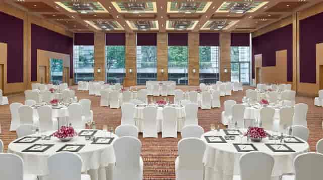 Grand Hyatt Mumbai Grand Ballroom with elegant tables for banquets and corporate events.