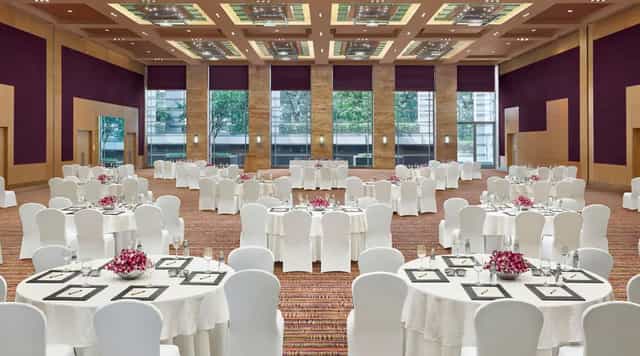 Grand Hyatt Mumbai Grand Ballroom with elegant tables for banquets and corporate events.