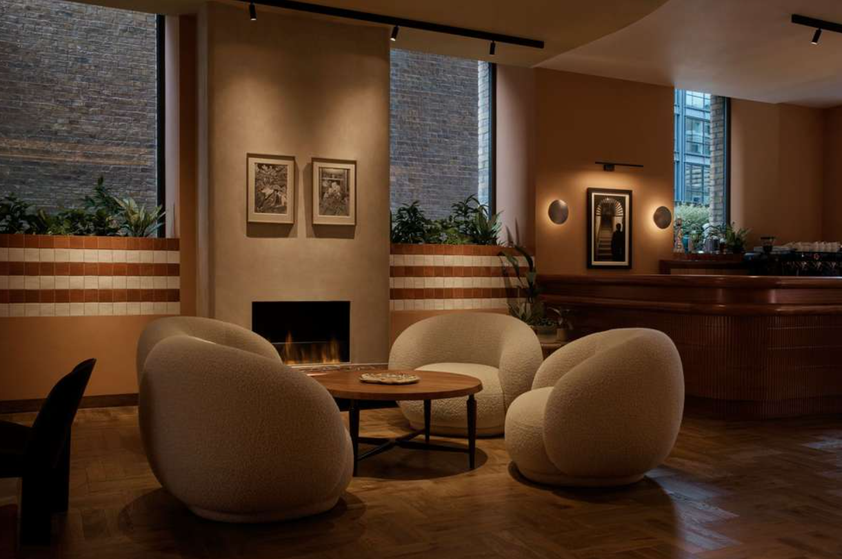 Cozy lounge at The Glasshouse, ideal for informal meetings and networking events.