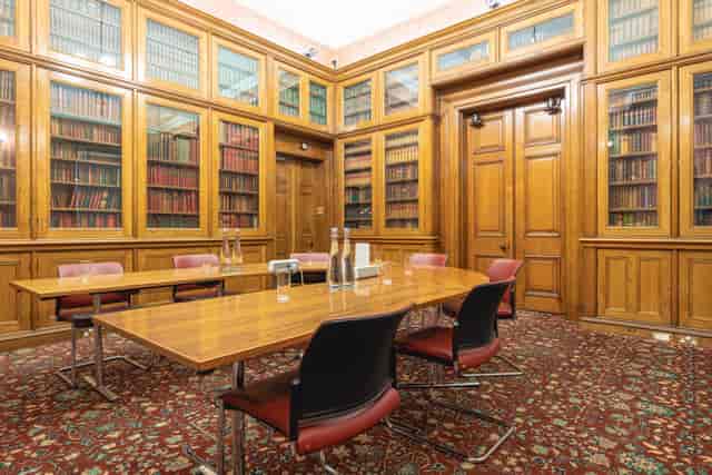 Hinshelwood Room boardroom at Royal Society of Chemistry with wood-paneled walls for private meetings.