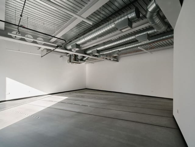 Industrial event venue space, Studio 101, for pop-up events and creative workshops.