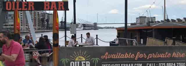 The Oiler Bar waterfront venue, open-air seating for casual networking and corporate events.
