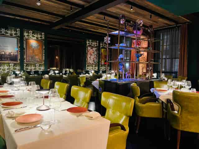 VATAVARAN dining rooms with chartreuse seating for upscale corporate dinners and networking events.