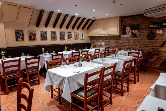 Cozy dining space at Sarracino Restaurant, ideal for networking events and private dinners.