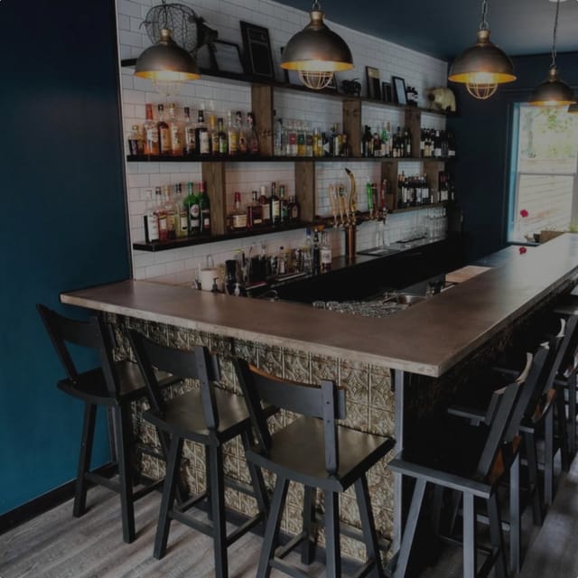 Sleek wine bar at Magnum & Steins, perfect for cocktail receptions and networking events.