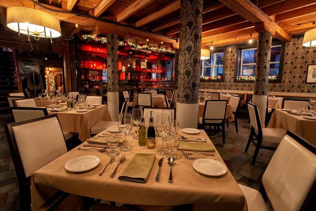 Private wine cellar dining space with elegant decor for intimate gatherings or corporate events.