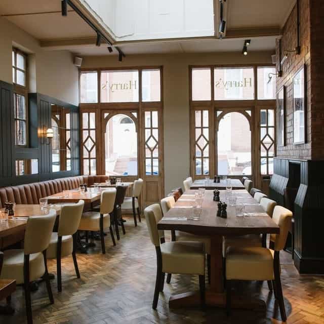 Private events room at Harry's Restaurant, featuring cozy decor for gatherings and meetings.