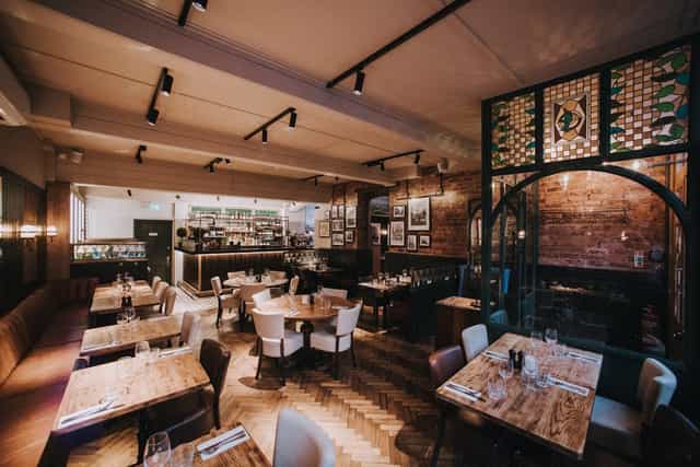 Private Events Room at Harry's Restaurant with elegant tables for formal gatherings.