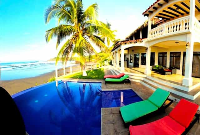 Beachfront venue at Las Flores Resort with infinity pool, perfect for retreats and events.