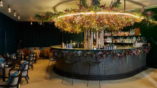 Sophisticated bar with floral decor at The Silly Goose, perfect for networking events.