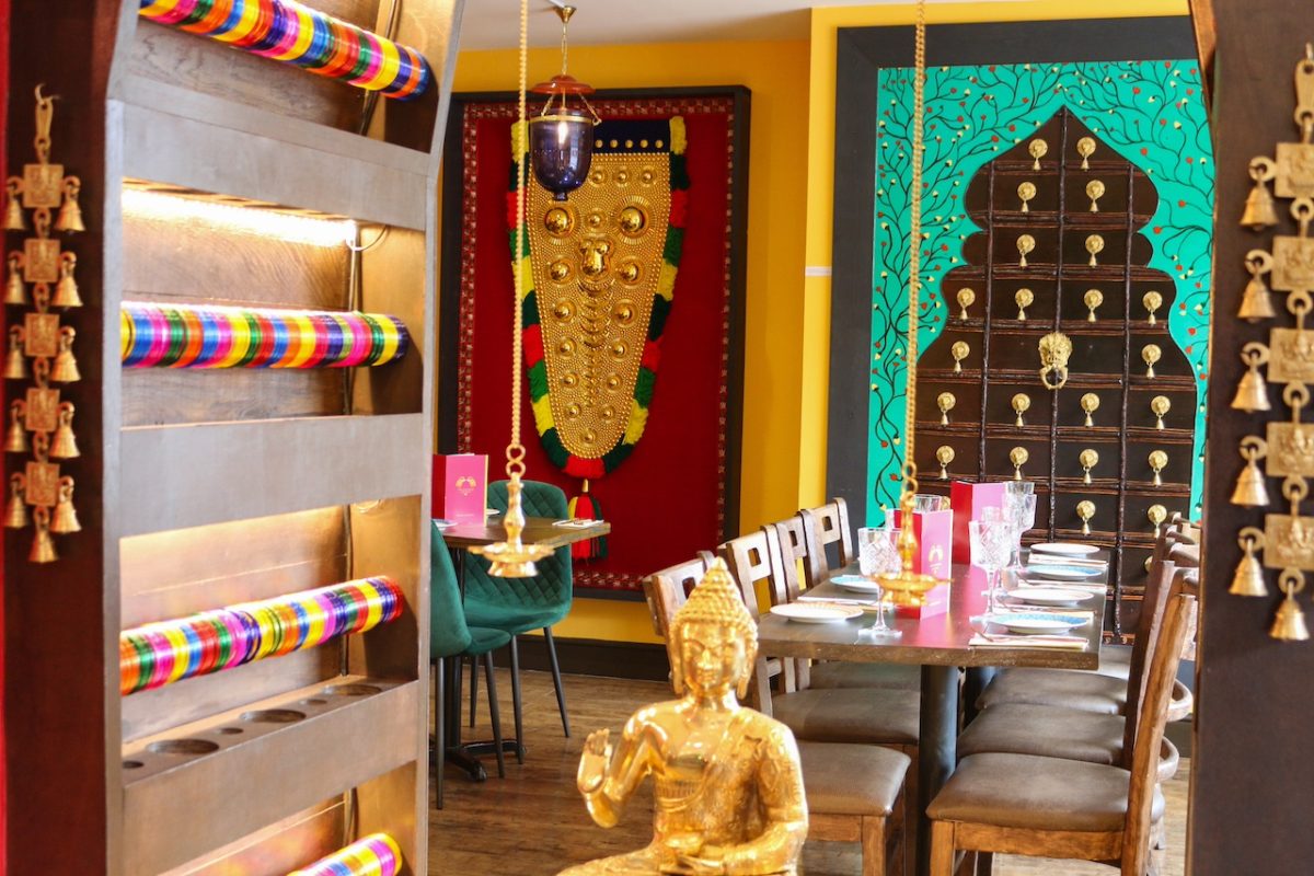 Private dining room at The Chennai Lounge with colorful decor for events and meetings.