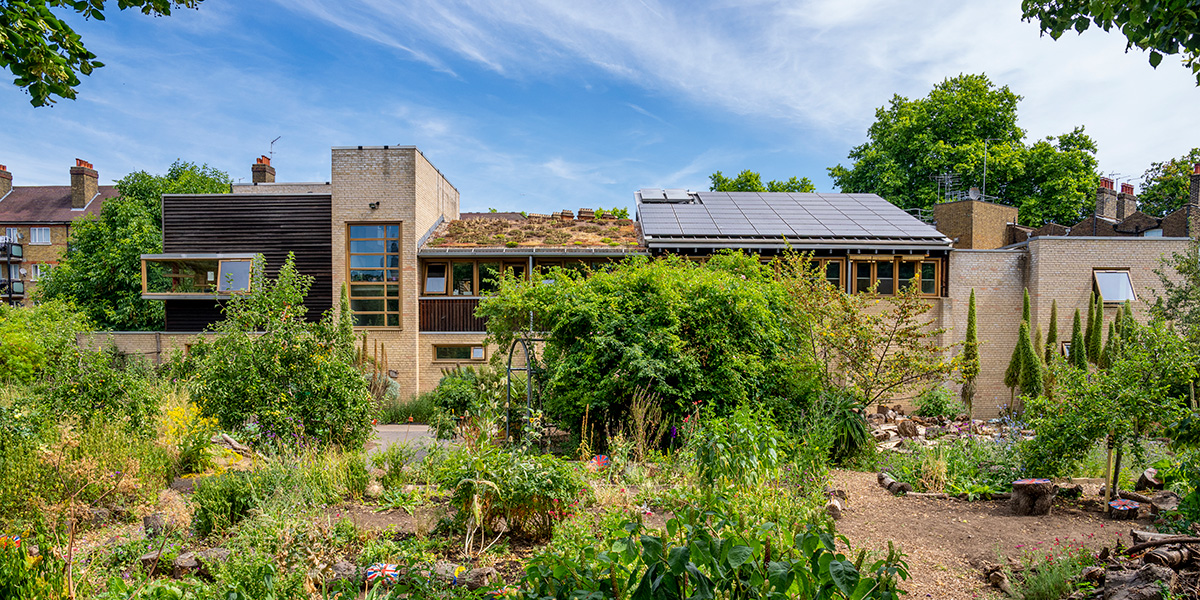 Main Hall & Gardens venue with modern architecture, perfect for eco-friendly events.
