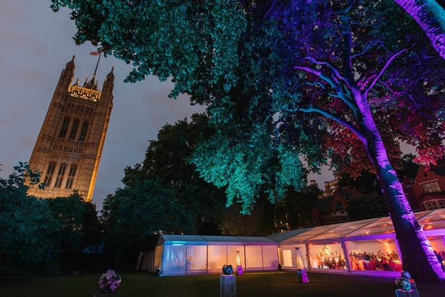 "Pavilion Gardens event space with elegant marquee and vibrant lighting in Hyde Park"