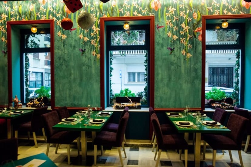 Vibrant 2 Mazi Restaurant venue with floral decor, ideal for events and gatherings.