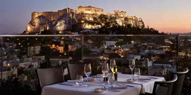 Electra Roof Garden dining setup with elegant table settings for corporate events in Athens.