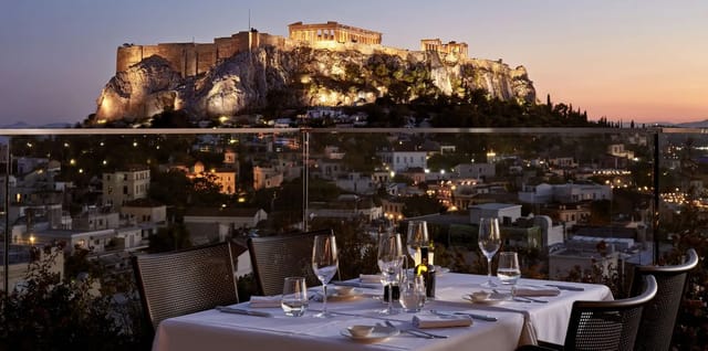 Electra Roof Garden dining setup with elegant table settings for corporate events in Athens.