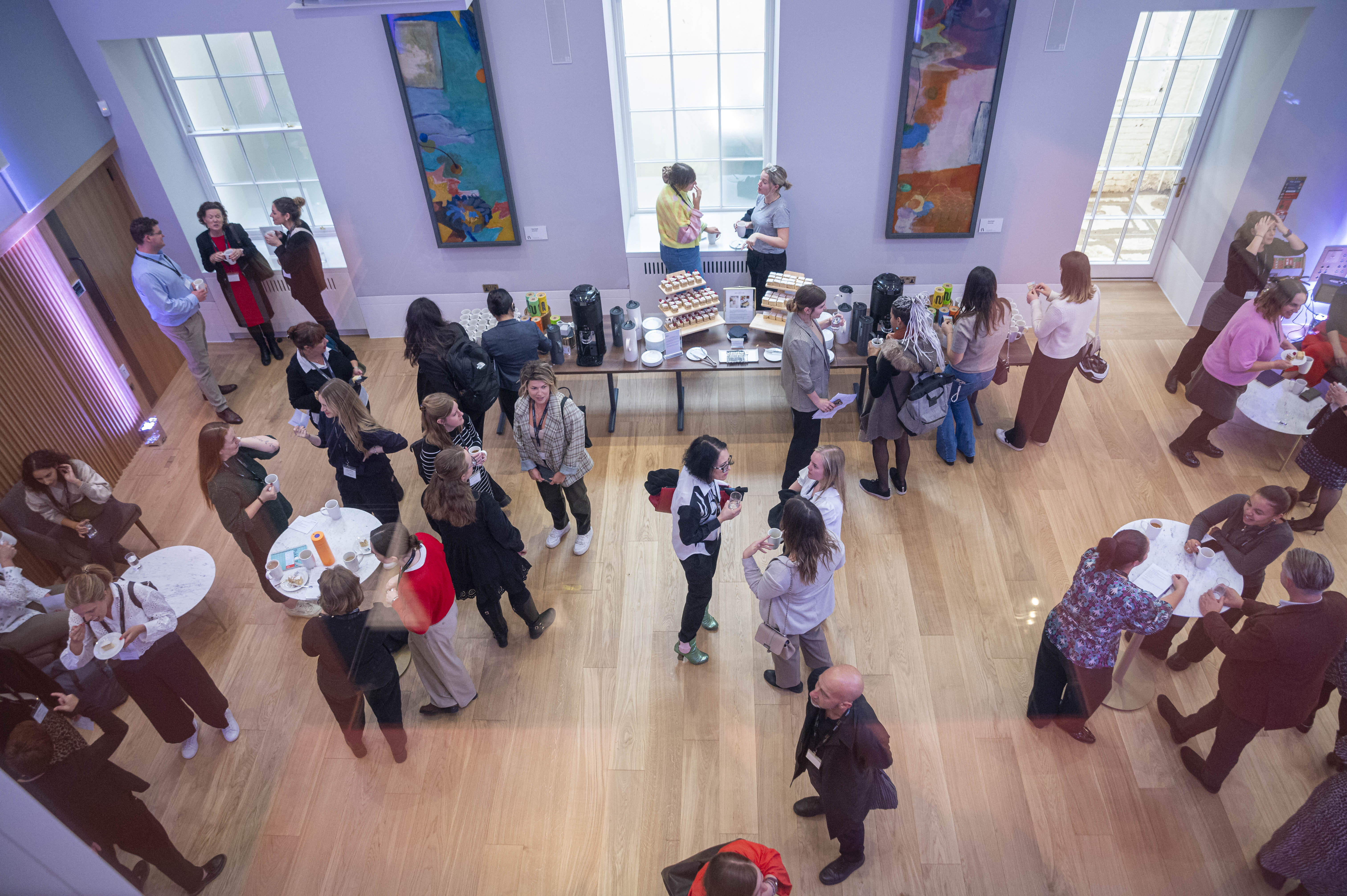 Vibrant networking event in elegant Lecture Room, Carlton House Terrace, fostering connections.
