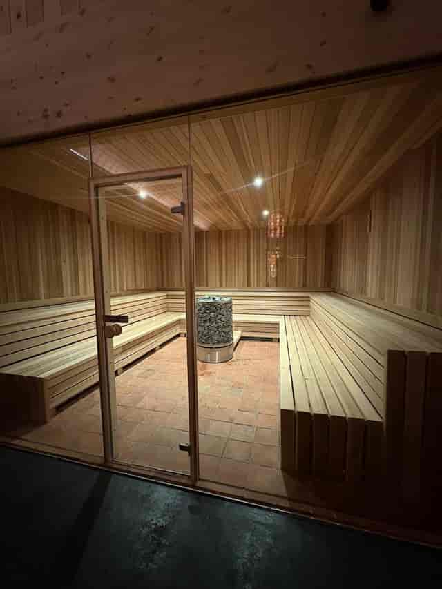 Modern sauna interior at WellNest Wellness Centre for retreats and corporate events.