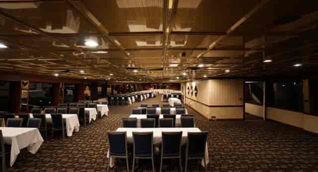 Timeless Mega Yacht event venue with elegant decor for corporate meetings and banquets.