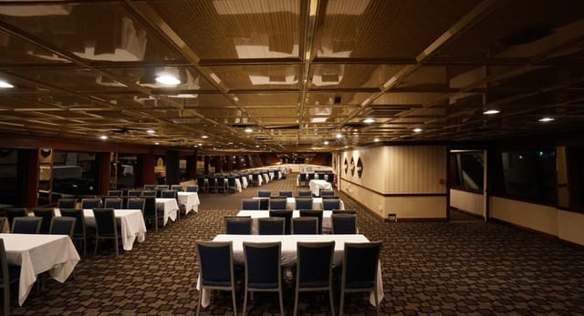 Timeless Mega Yacht event venue with elegant decor for corporate meetings and banquets.