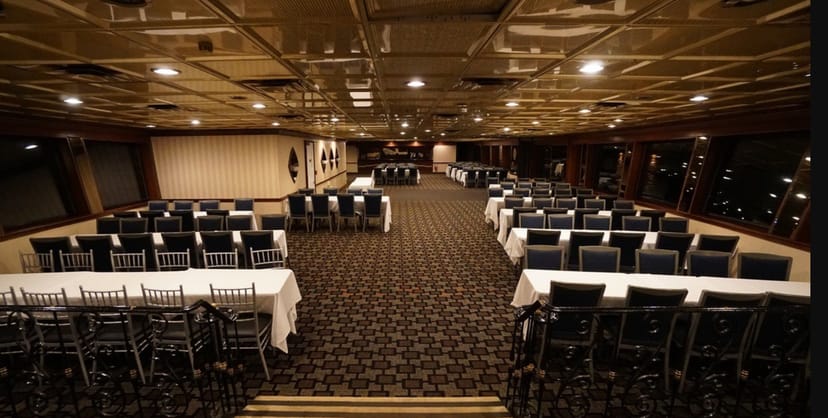 Timeless Mega Yacht meeting room, spacious and elegant for corporate events and workshops.