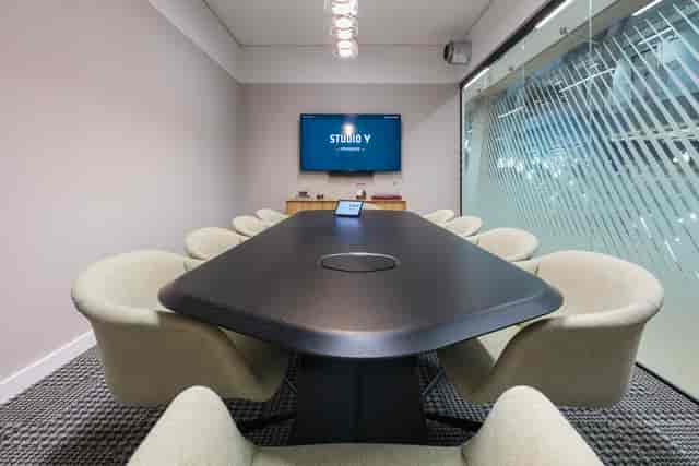 Modern Sketch boardroom with AV tech for hybrid meetings and professional corporate workshops.
